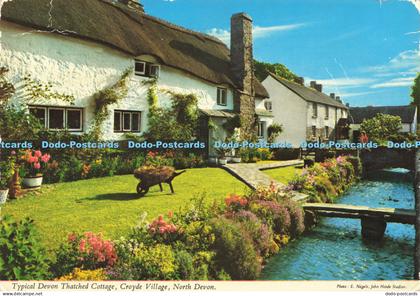 D157594 North Devon. Typical Devon Thatched Cottage. Croyde Village. John Hinde.