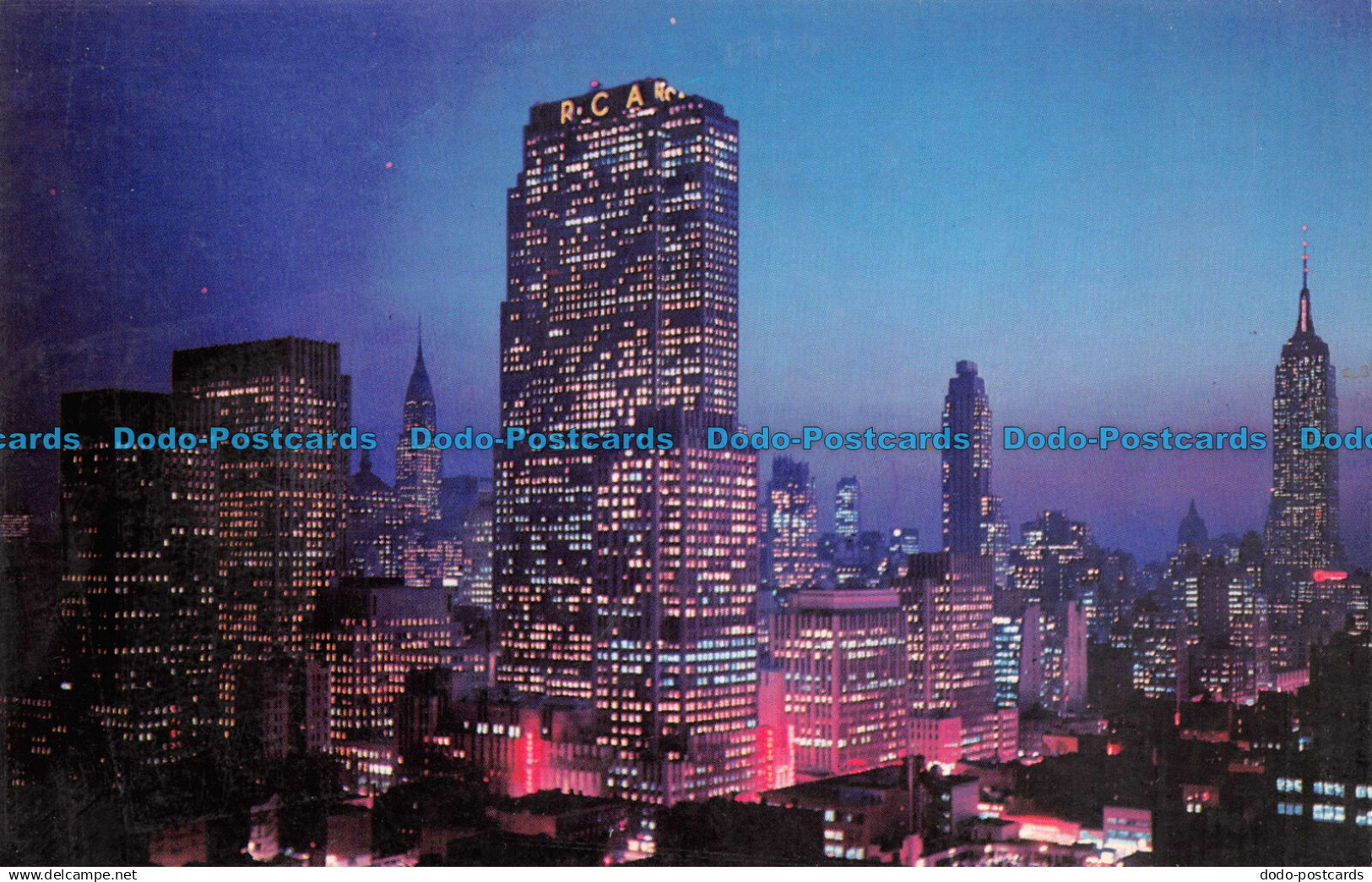 R081508 Night Falls on Midtown Manhattan. New York City. Manhattan Post Card. De