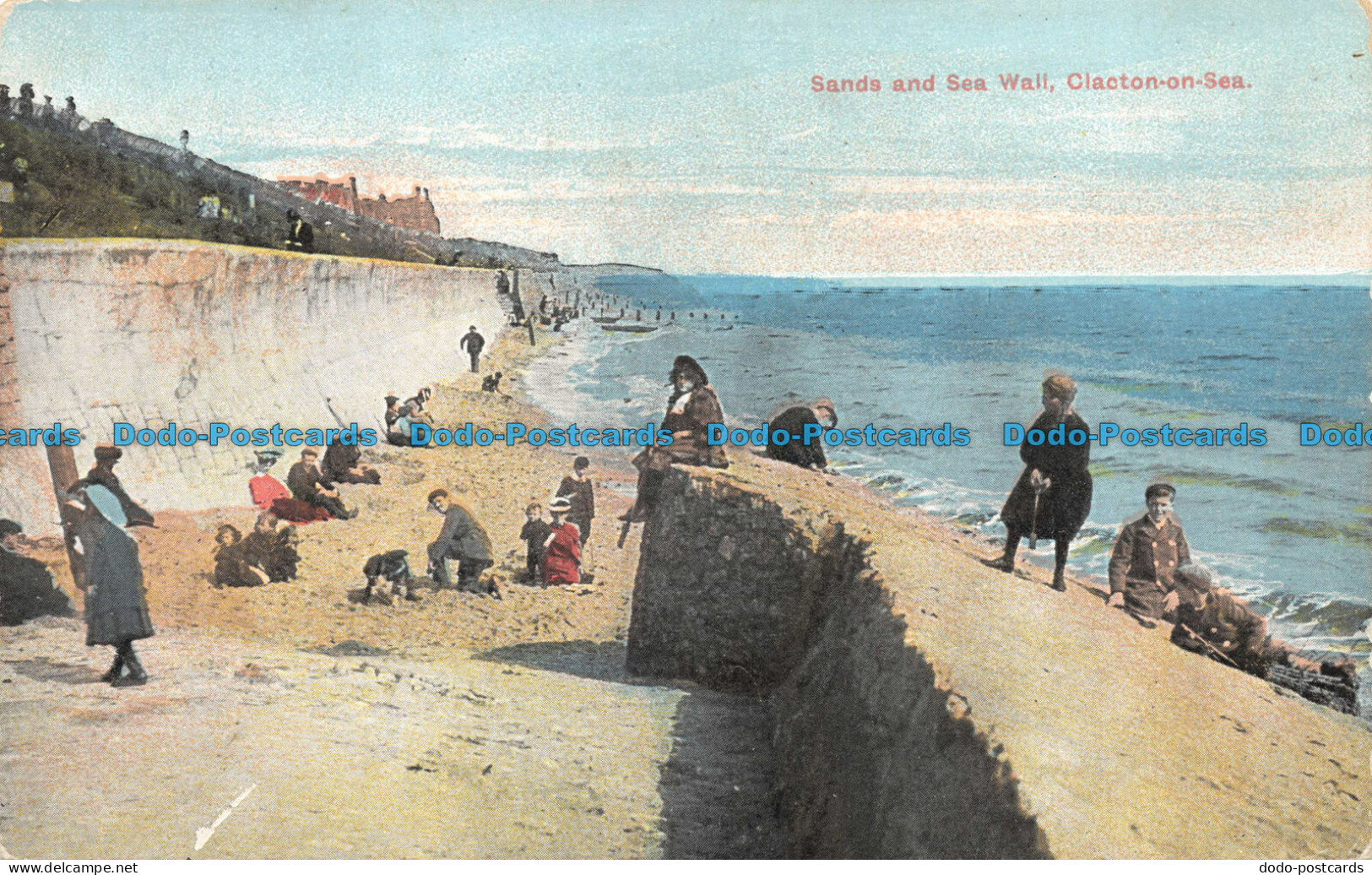 R146237 Sands and Sea Wall. Clacton on Sea. 1908