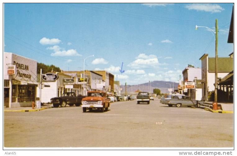 Saratoga WY Wyoming, Street Scene, Donelan Pharmacy Drug Store, Autos, Truck c1960s Vintage Postcard