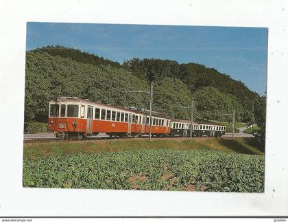 UN TRAIN D'ABONNES PRES DE JOUXTENS - MEZERY LE 28 JUIN 1985 .CHEMIN DE FER LAUSANNE ECHALLENS BERCHER (L E B)