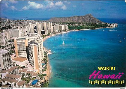 Etats Unis - Hawaï - Honolulu - Waikiki - Halekulani and Sheraton Waikiki Hotel along Waiki Beach in Honolulu - Aerial v