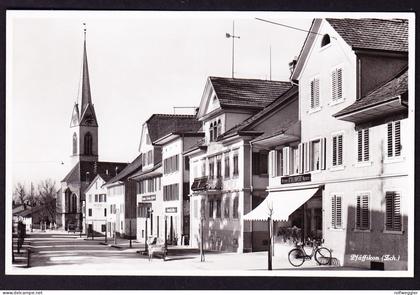 1933 gelaufene AK aus Pfäffikon ZH. Mit Geschäftsstrasse