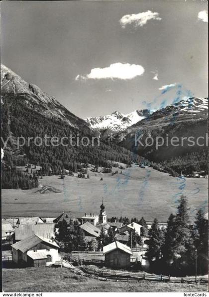 11641176 Madulain Ortsansicht mit Kirche Alpenpanorama