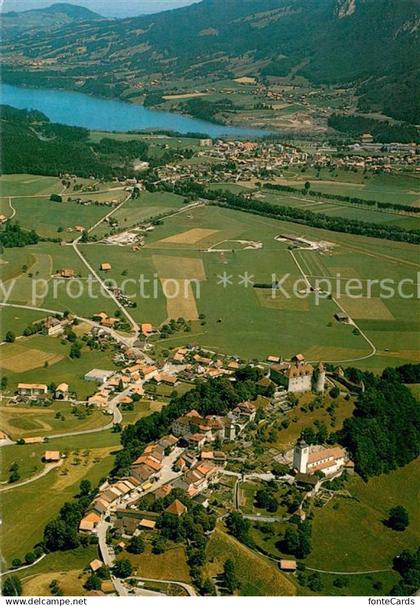 13644830 Gruyeres FR au fond Broc et Lac de la Gruyere vue aérienne Gruyeres FR