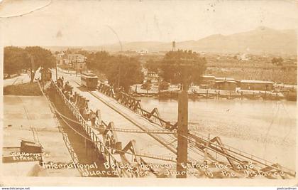 EL PASO (TX) International bridge between El Paso and Ciudad Juarez (Mexico) - Ciudad Juarez in the distance - REAL PHOT