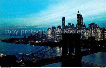 72646531 Manhattan New York Nightfall in Lower Manhattan Brooklyn Bridge