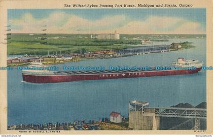 R008554 The Wilfred Sykes Passing Port Huron. Michigan and Sarnia. Ontario. Port