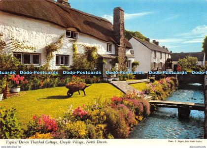 D046866 North Devon. Typical Devon Thatched Cottage. Croyde Village. John Hinde.