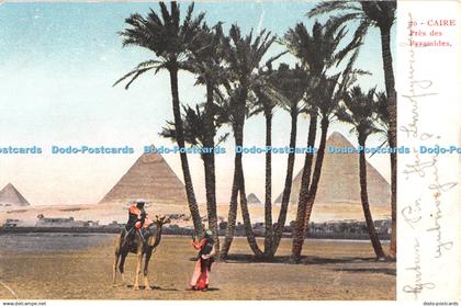 R347443 Caire Pres des Pyramides Postcard